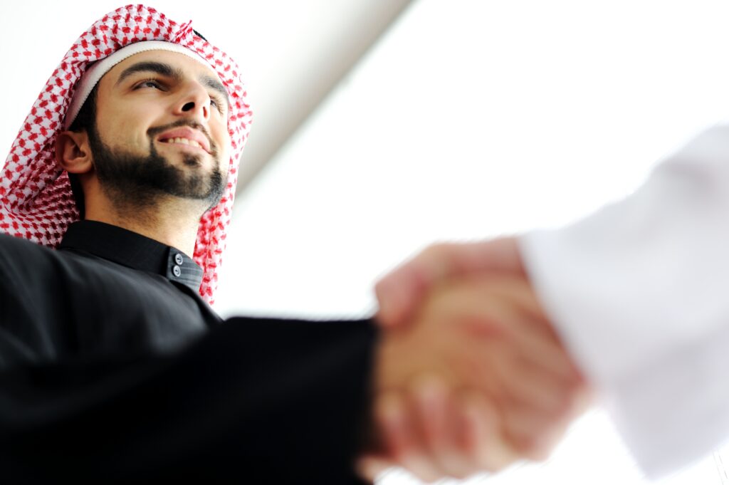 Two People Handshaking