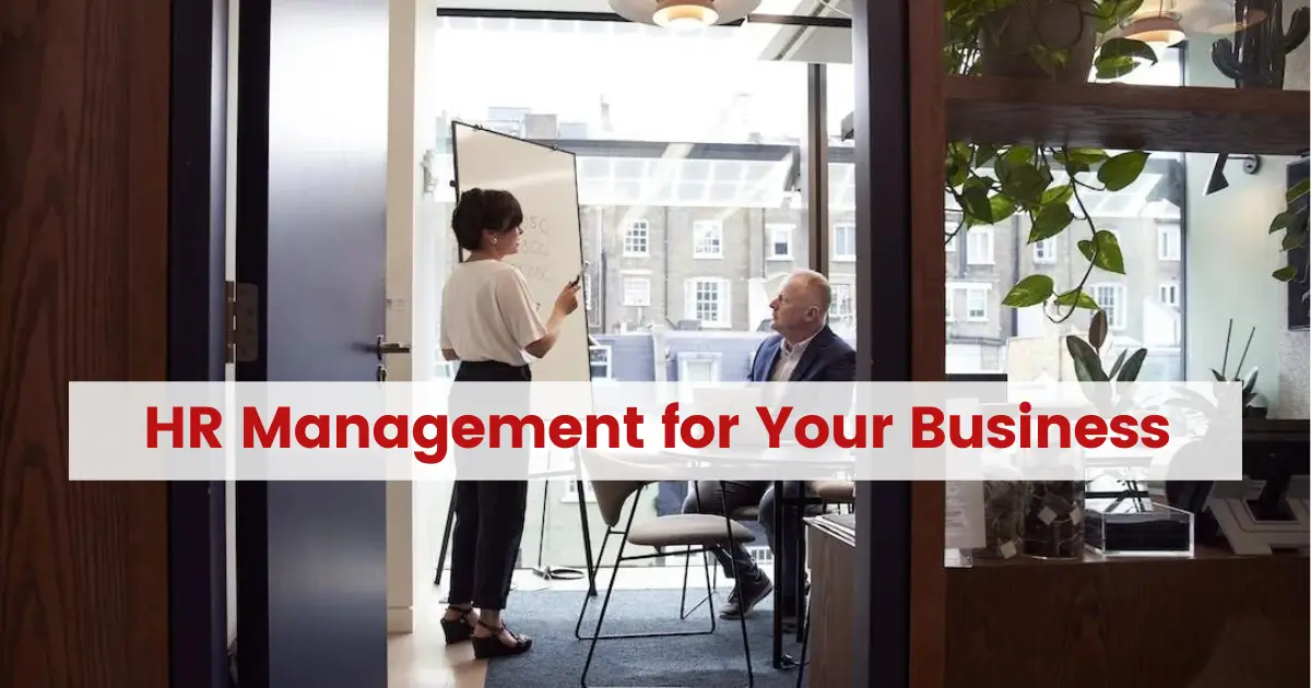 A lady HR consultant in Dubai showing work-related things to the client using a whiteboard