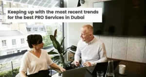 Discussion between a woman and man from the best PRO services in Dubai